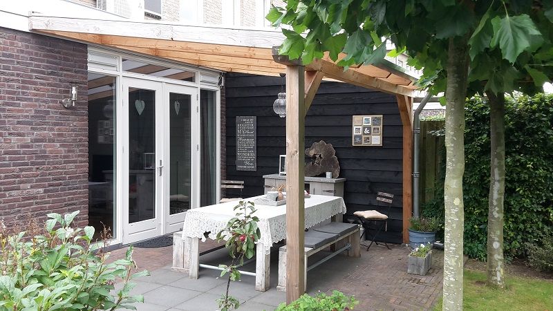 Douglas veranda op 2 staanders met dichte wand - Elst Douglas veranda op 2 staanders met dichte wand - Elst