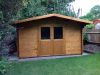 Tuindeco Murcia Blokhut 400x300 cm + luifel 70 cm 34 mm vuren bruin geïmpregneerd