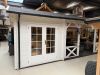 Interflex 6732 Blokhut 667x320 cm 40 mm vuren compleet wit gecoat incl. zwarte dakshingles, composiet funderingsbalken, antraciet vlonder en gootset - Showmodel Numansdorp